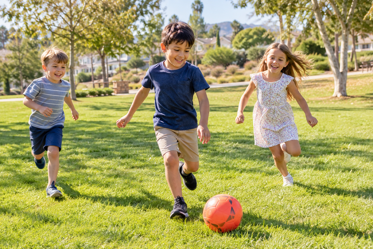 Children playing ball in a park, landscape photo